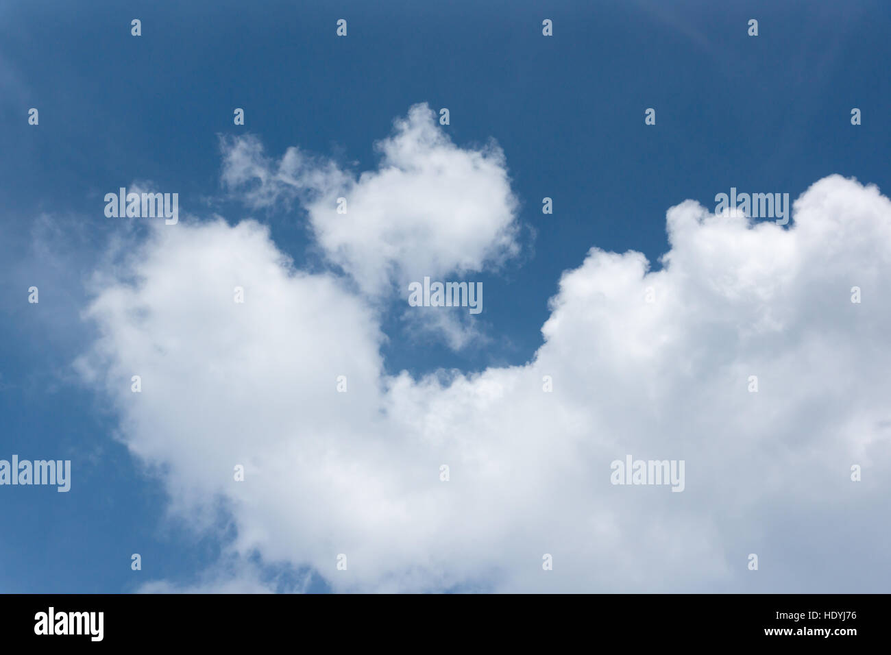 white clouds floating on a background of blue sky Stock Photo - Alamy