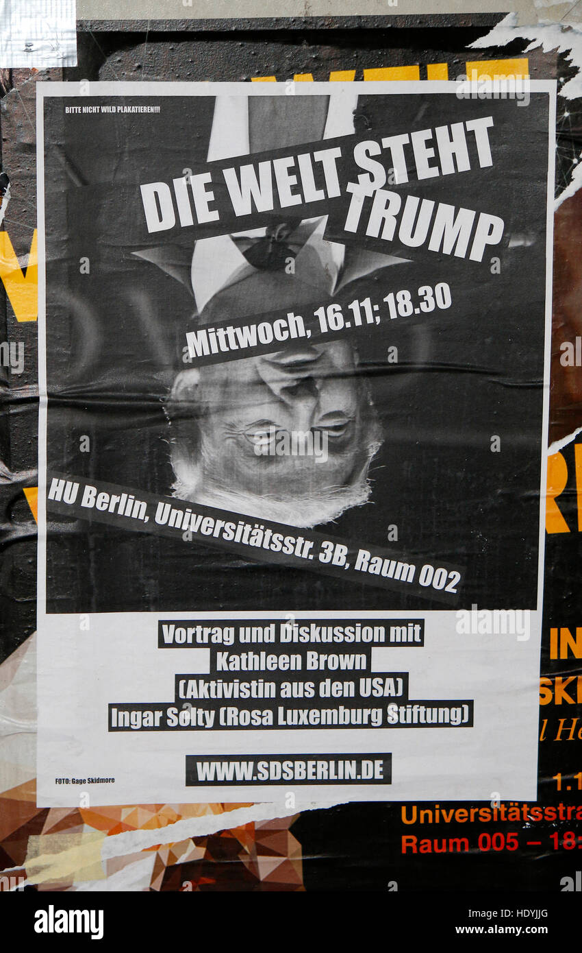 Plakatankuendigung fuer eine Demonstration unter dem Motto 'Die Welt steht Trump' mit einem umgedrehrten Portrait des neuen US-Praesidenten Donald Tru Stock Photo
