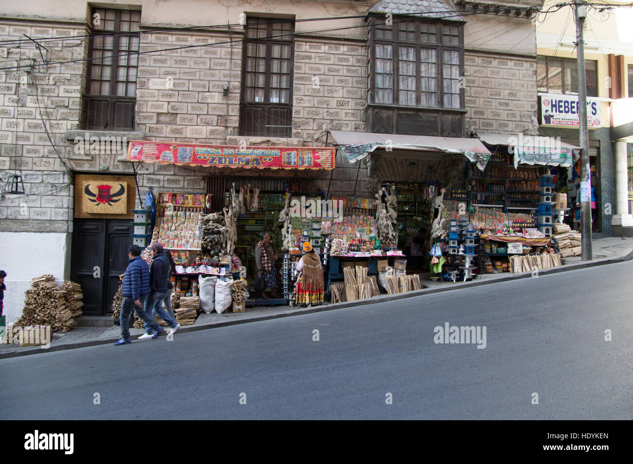 Street in La Paz, Bolivia, a shop sells dried llama fetuses, wood and other items to prepare offerings to the mother earth god Stock Photo