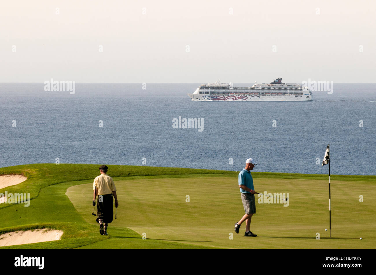 Cruise ship passing offshore of Princeville Golf Club, Princeville,  Kauai, Hawaii. Stock Photo