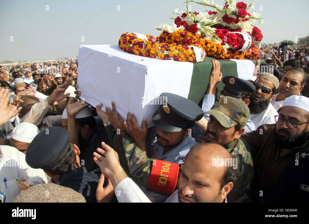 People carrying coffin of slain Junaid Jamshed who died in PIA PK661