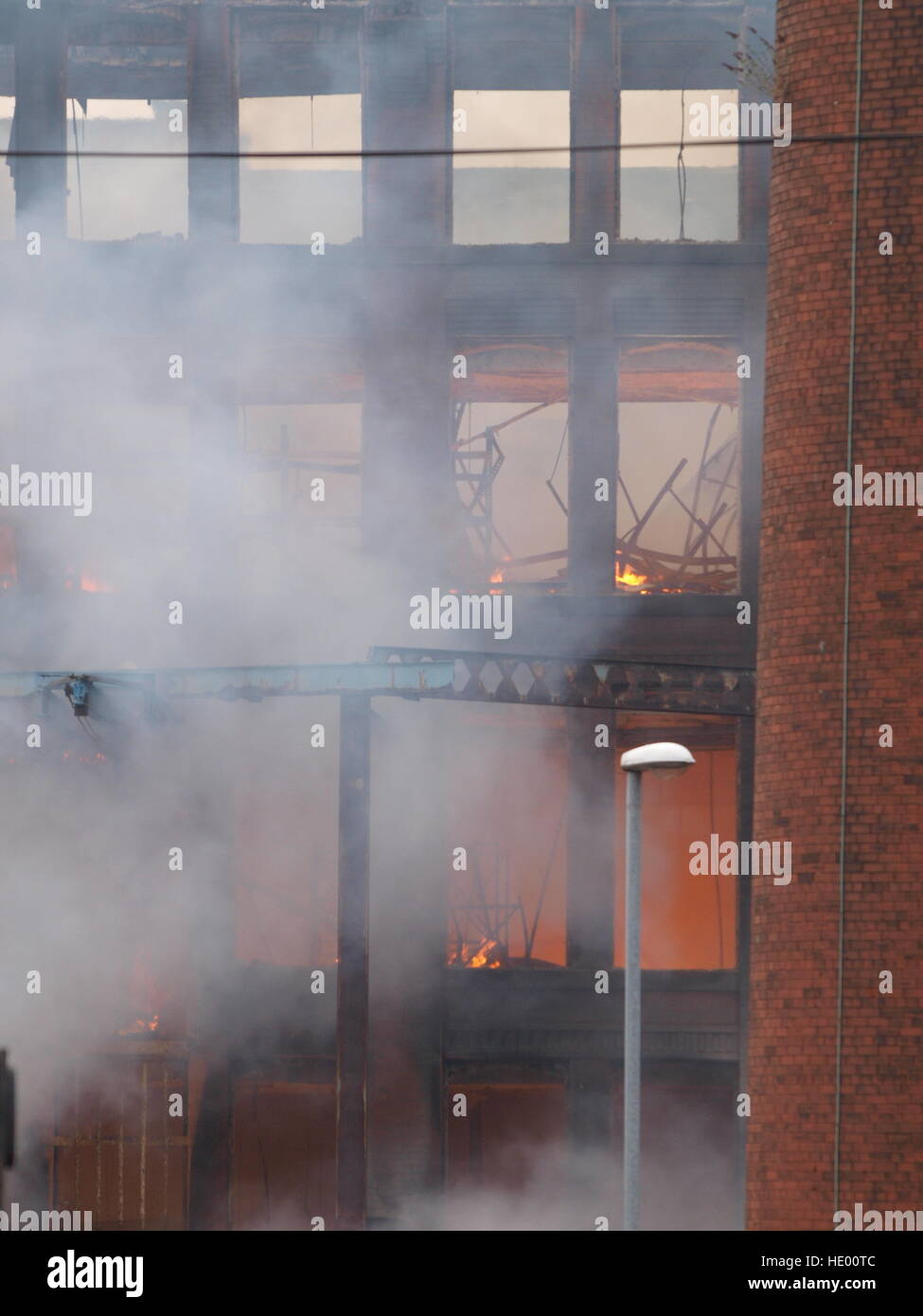 Oldham, UK. 15th Dec, 2016. Emergency services have evacuated more than 100 nearby properties after a large blaze broke out at a paper mill site in Greater Manchester. More than 70 firefighters and 15 fire engines from Greater Manchester Fire and Rescue Service are tackling the fire at the building on Cardwell Street in Oldham, north-east of Manchester, on Thursday morning. © M Kyle/Alamy Live News Stock Photo