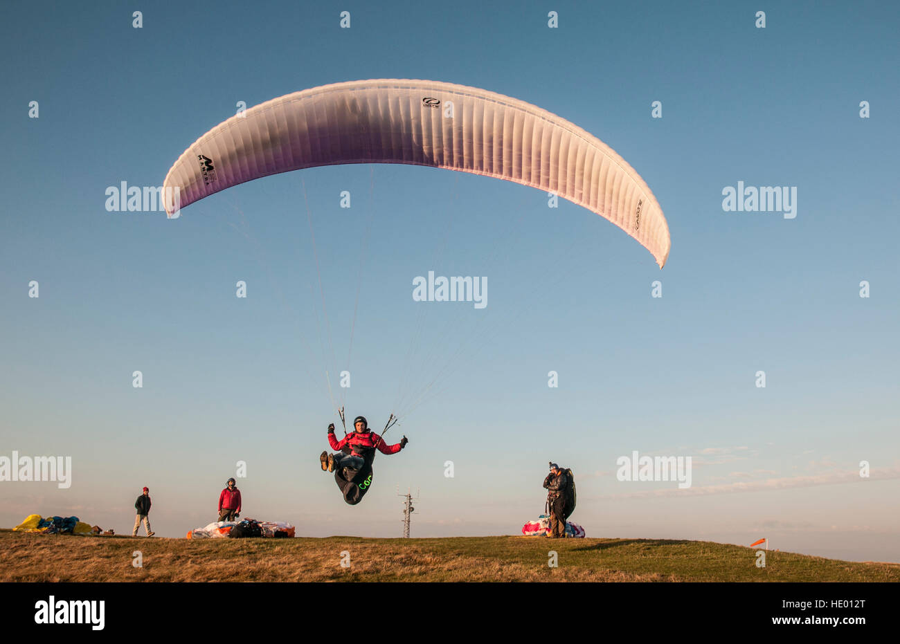 Beachy Head, Eastbourne, East Sussex, UK. 15th Dec, 2016. Southerly wind makes for perfect Paragliding conditions on the South Coast. © Stock Photo