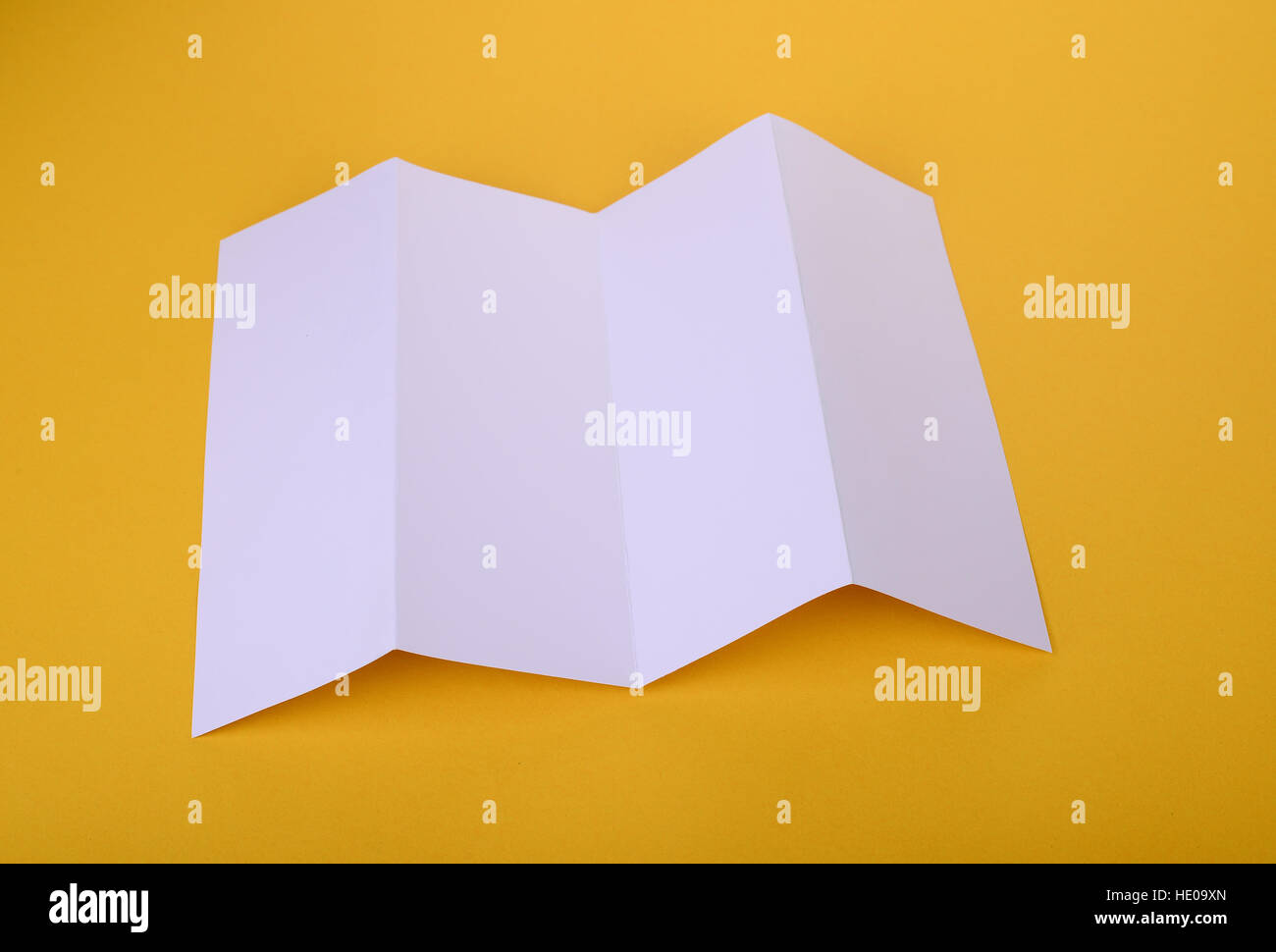 Download White Paper Four Fold Brochure Mockup On Yellow Background Stock Photo Alamy PSD Mockup Templates