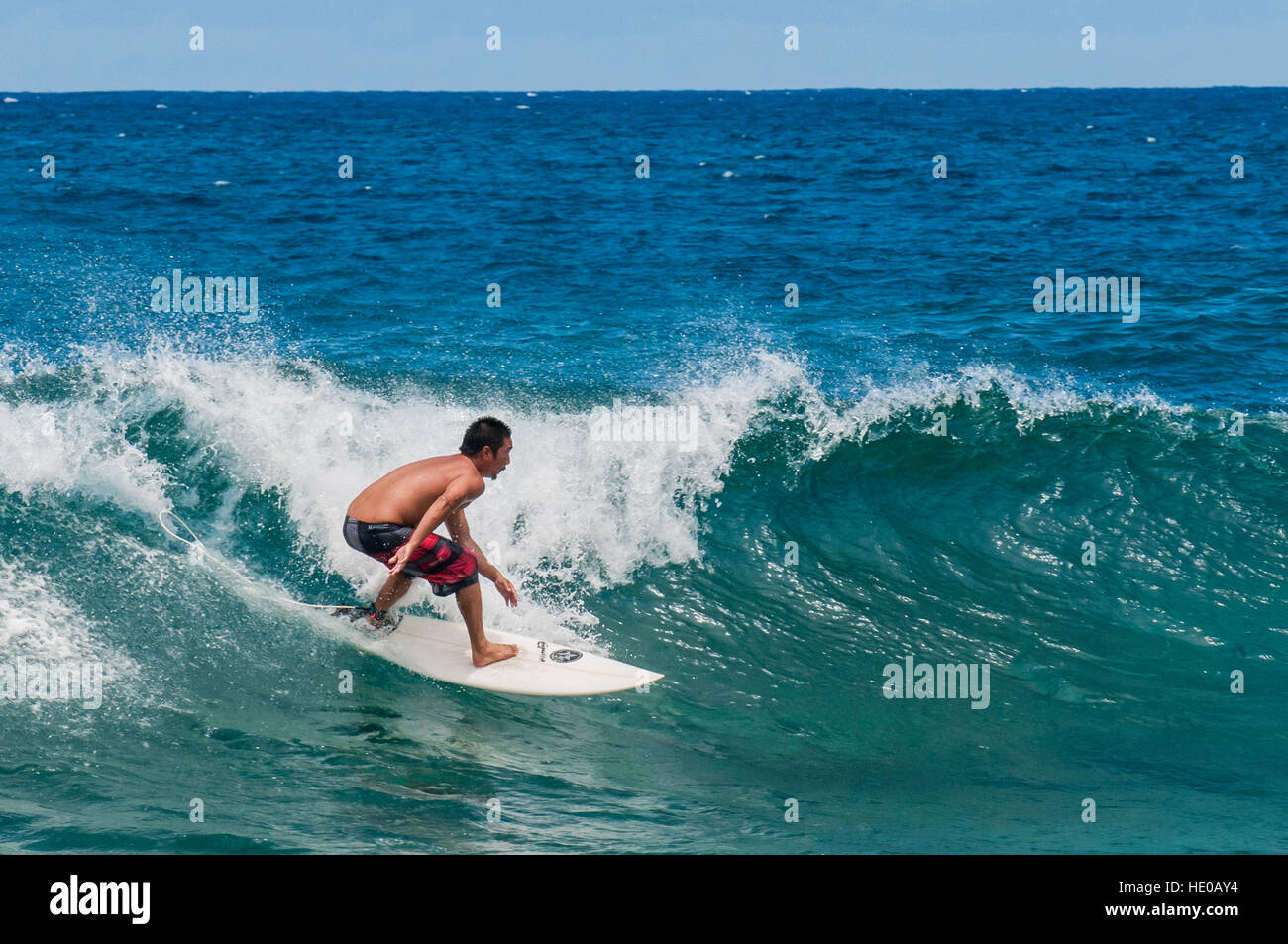 Surfing At Sunset Beach North Shore Oahu Hawaii Stock Photo Alamy