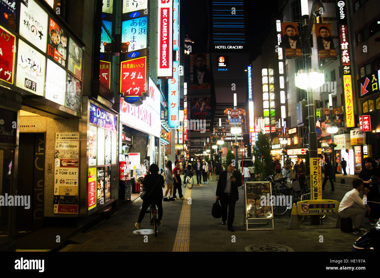 Japanese people and travelers foreigner walking for shopping and travel at nightlife in small alley at Shinjuku city on October 20, 2016 in Tokyo, Jap Stock Photo