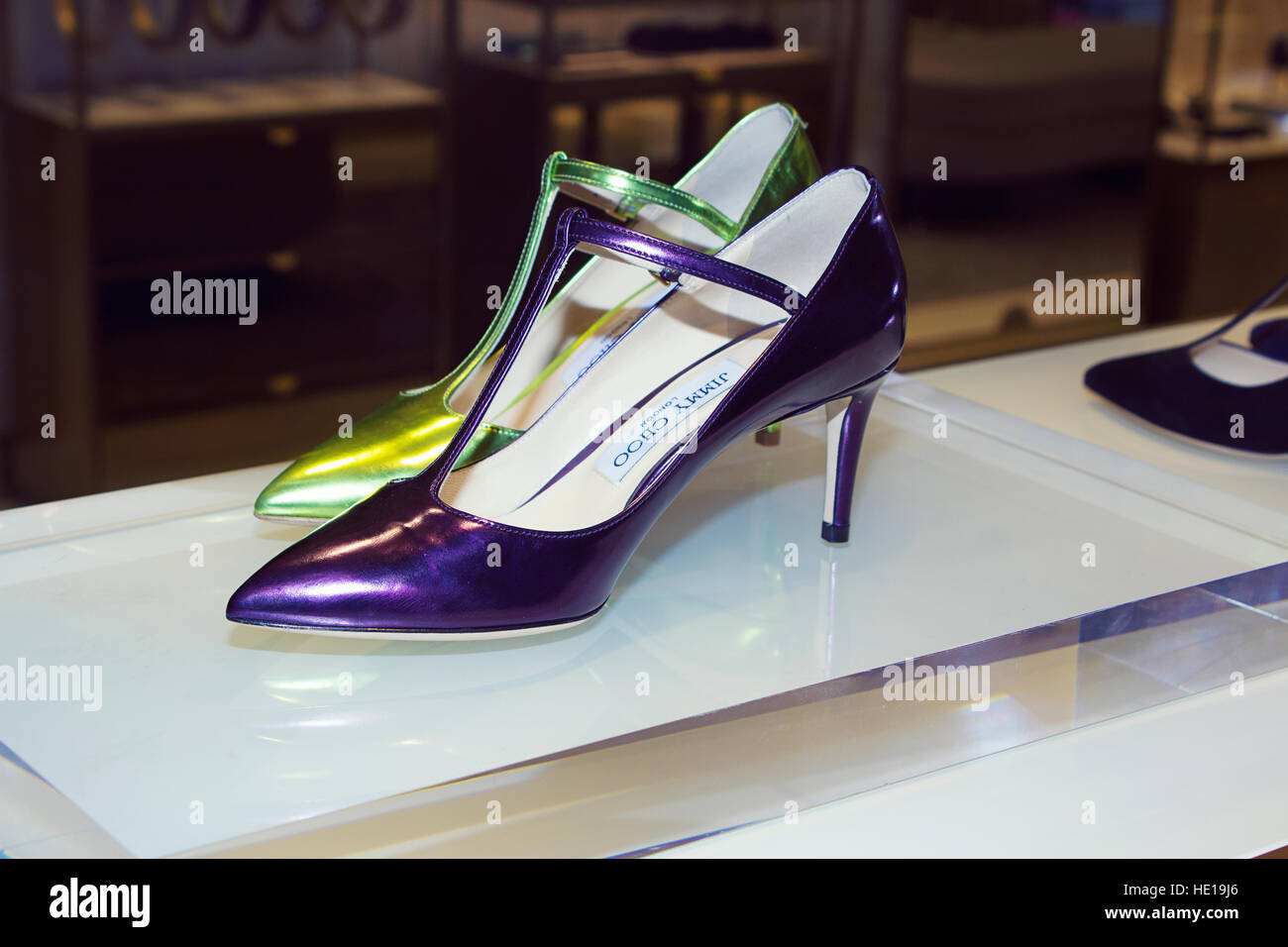 Haute couture accessory fashion window: Casadei women leather colorful shoes,  with high heels on transparent table Stock Photo - Alamy
