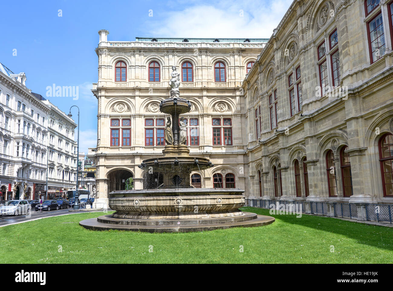 Photo view on fountain and statue at vienna opera state house, austria Stock Photo