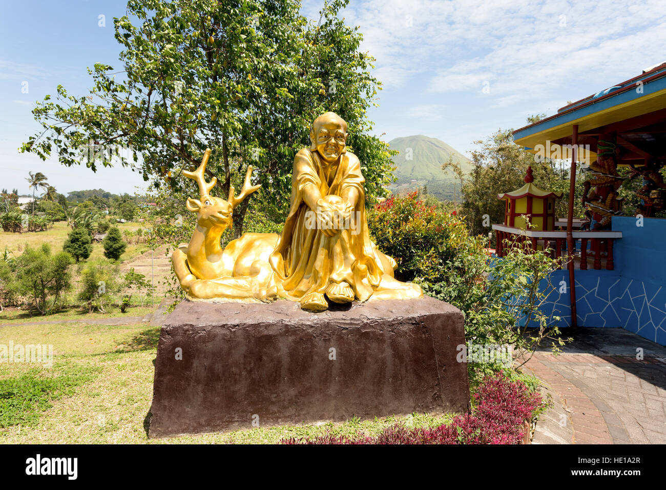 SULAWESI, INDONESIA - AUGUST 8.2015:, Buddhistic fat monk statue in complex Pagoda Ekayana, north Sulawesi,August 8. 2015 Sulawesi, Indonesia Stock Photo