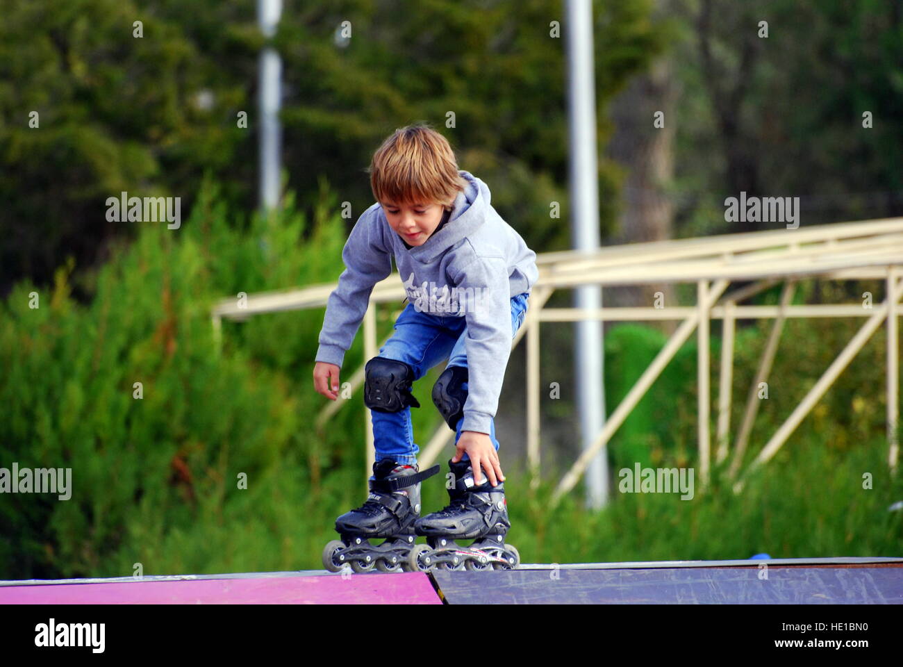 The ride on the rollers. Training for riding on roller skates Stock