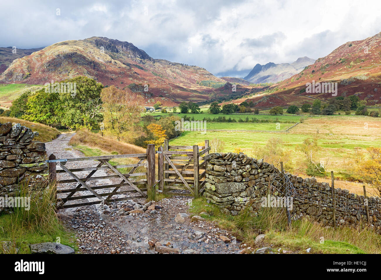 Wooden gateway in Little Langdale, the Lake District, England.The Langdale Pikes can be seen in the background. Stock Photo
