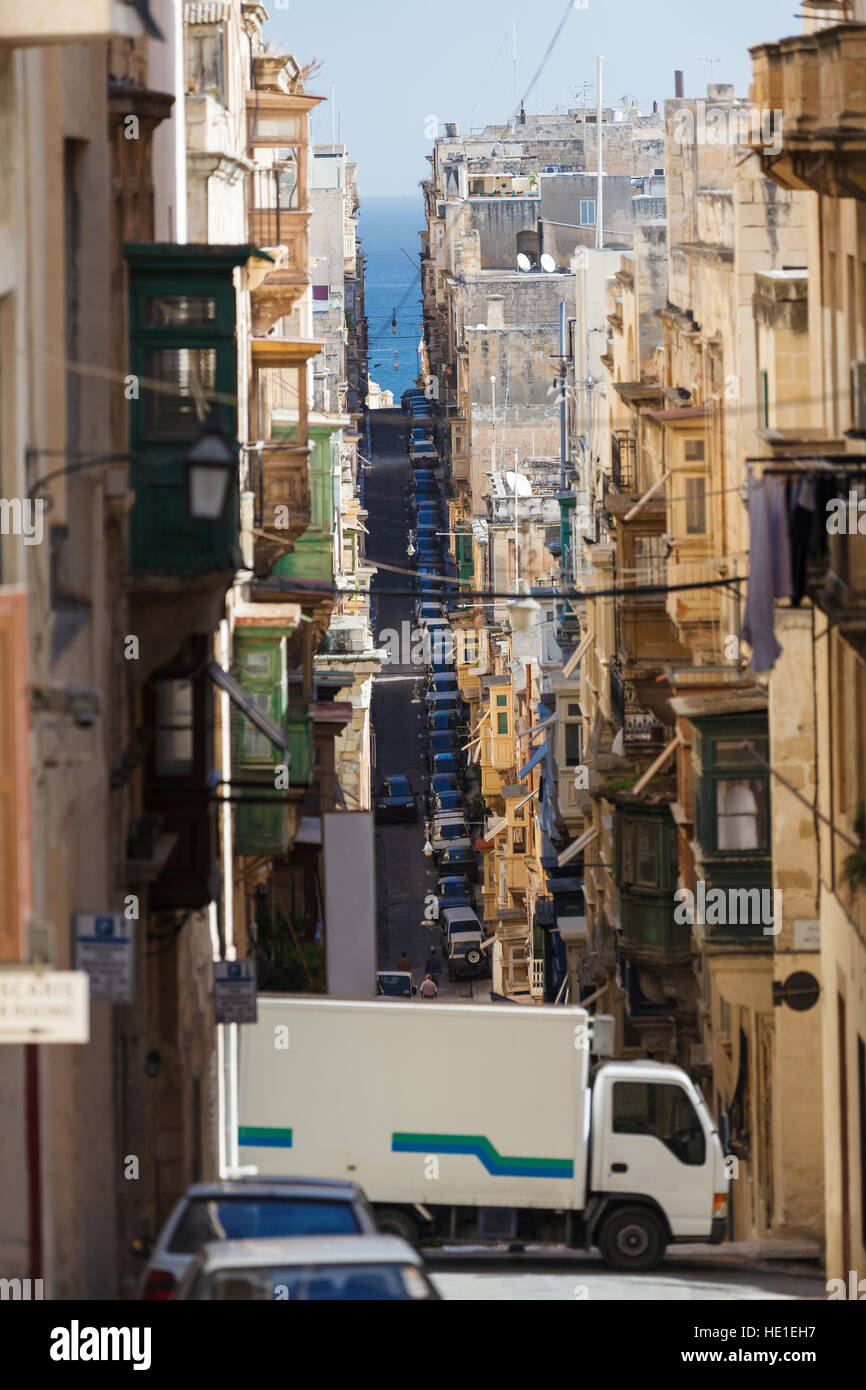 Busy narrow St. Ursula street, Valletta, Malta Stock Photo