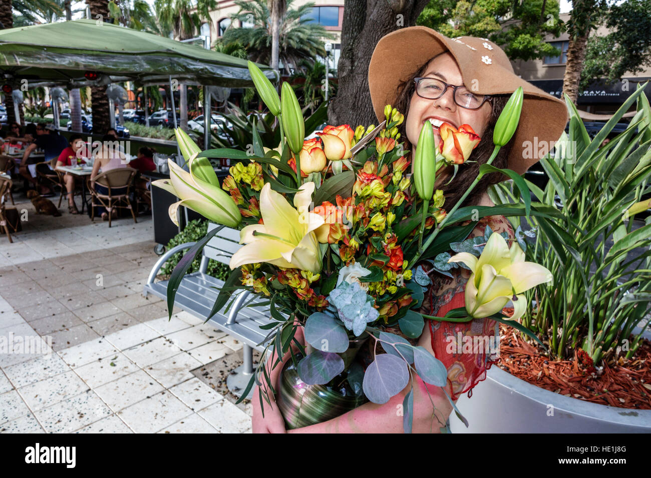 St. Saint Petersburg Florida,Beach Drive,adult adults,woman female women,flowers,bouquet,FL161129082 Stock Photo