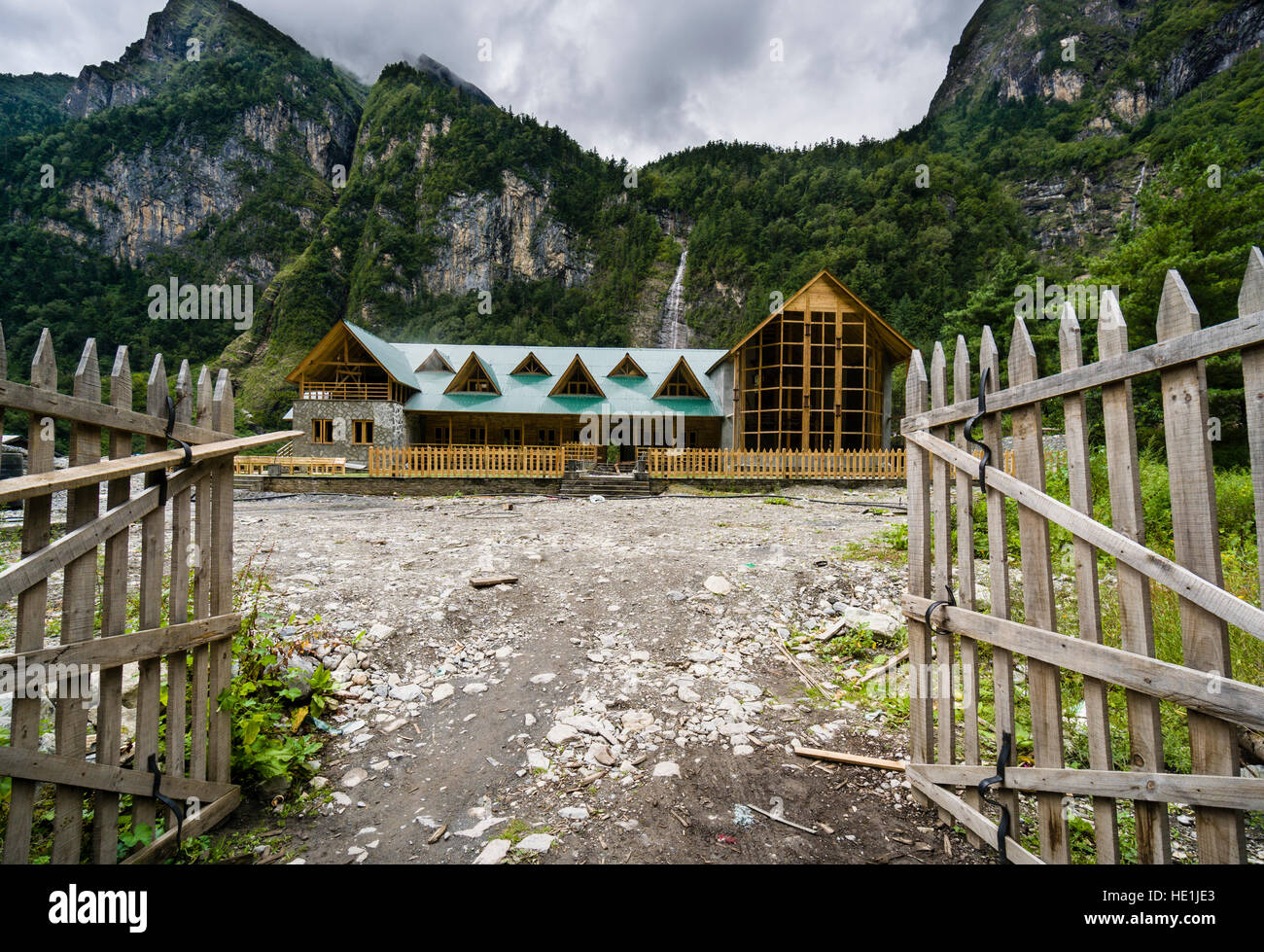 Construction of a luxurious hotel near a apple orchard in Upper Marsyangdi valley Stock Photo