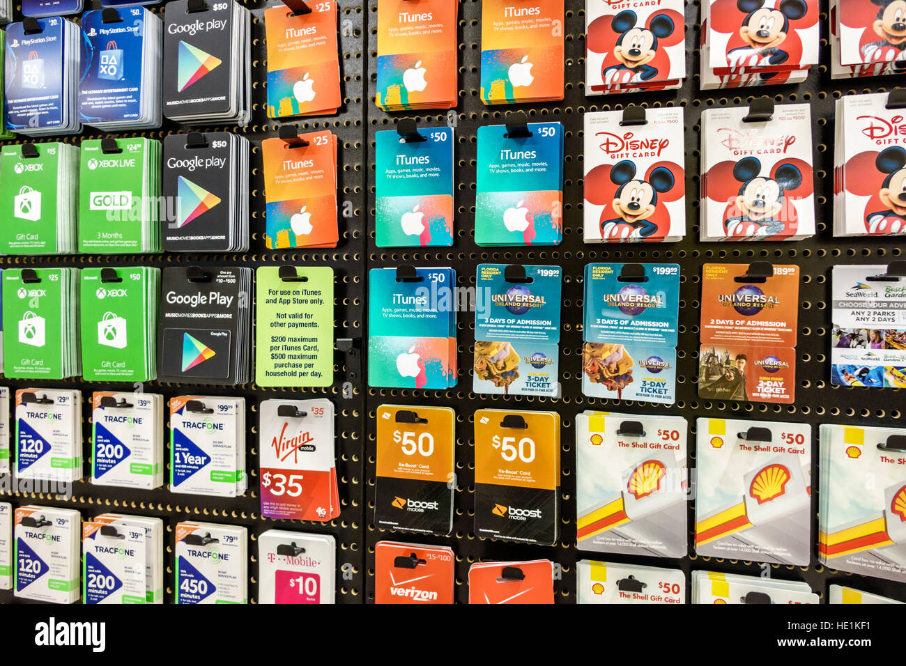 Viersen, Germany - June 9. 2021: Closeup of Apple app store iTunes and  Google Play voucher gift Cards in a row in shelf of german shop (Focus on  cente Stock Photo - Alamy