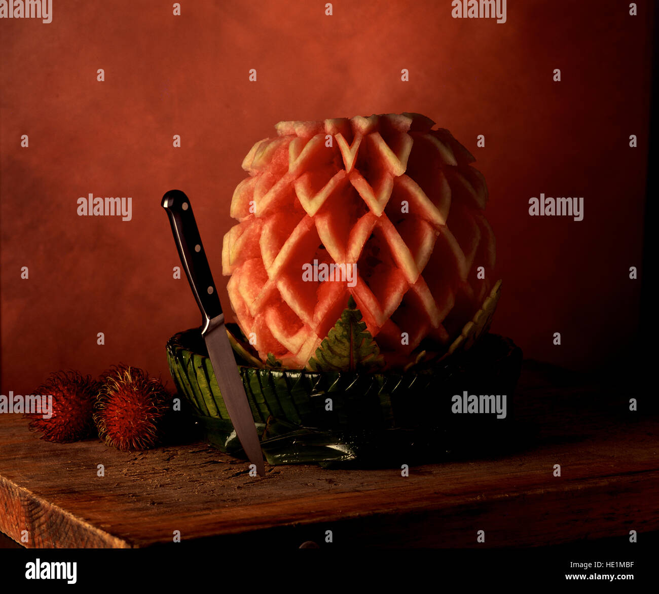 Carved watermelon and knife. Stock Photo