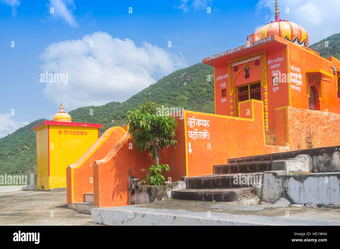 Orange temple building situated just outside Pushkar, Rajasthan, India Stock Photo