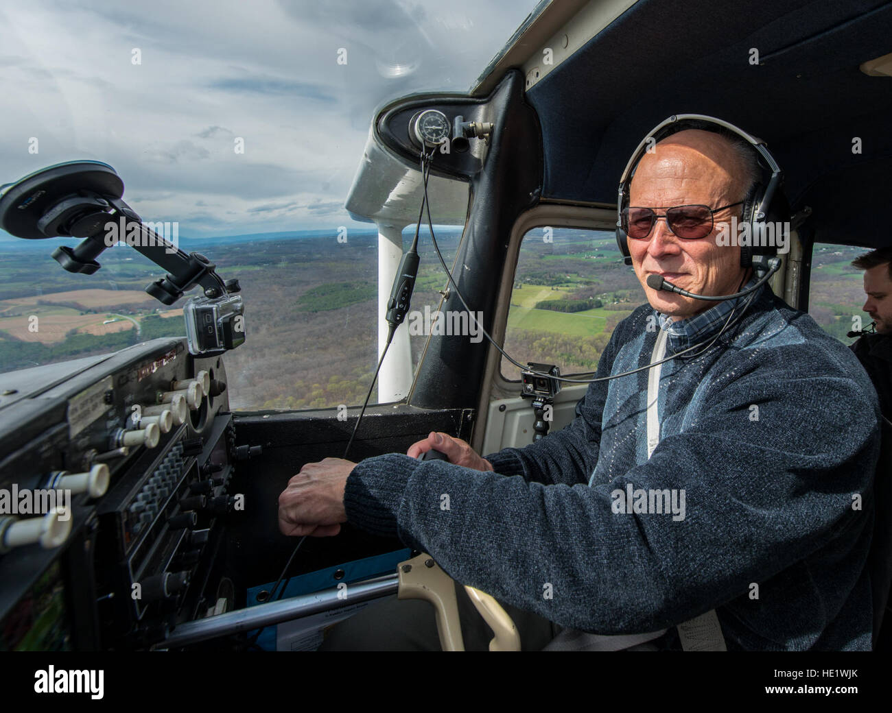 Retired Col. Pete Mapes, a pilot-physician, demonstrates a ground collision avoidance system he installed on his Cessna aircraft during a flight over Maryland, April 7, 2016. Mapes was instrumental to the employment the Automatic  Ground Collision Avoidance System in F-16 fighter jets across the Air Force. /Master Sgt. Brian Ferguson Stock Photo
