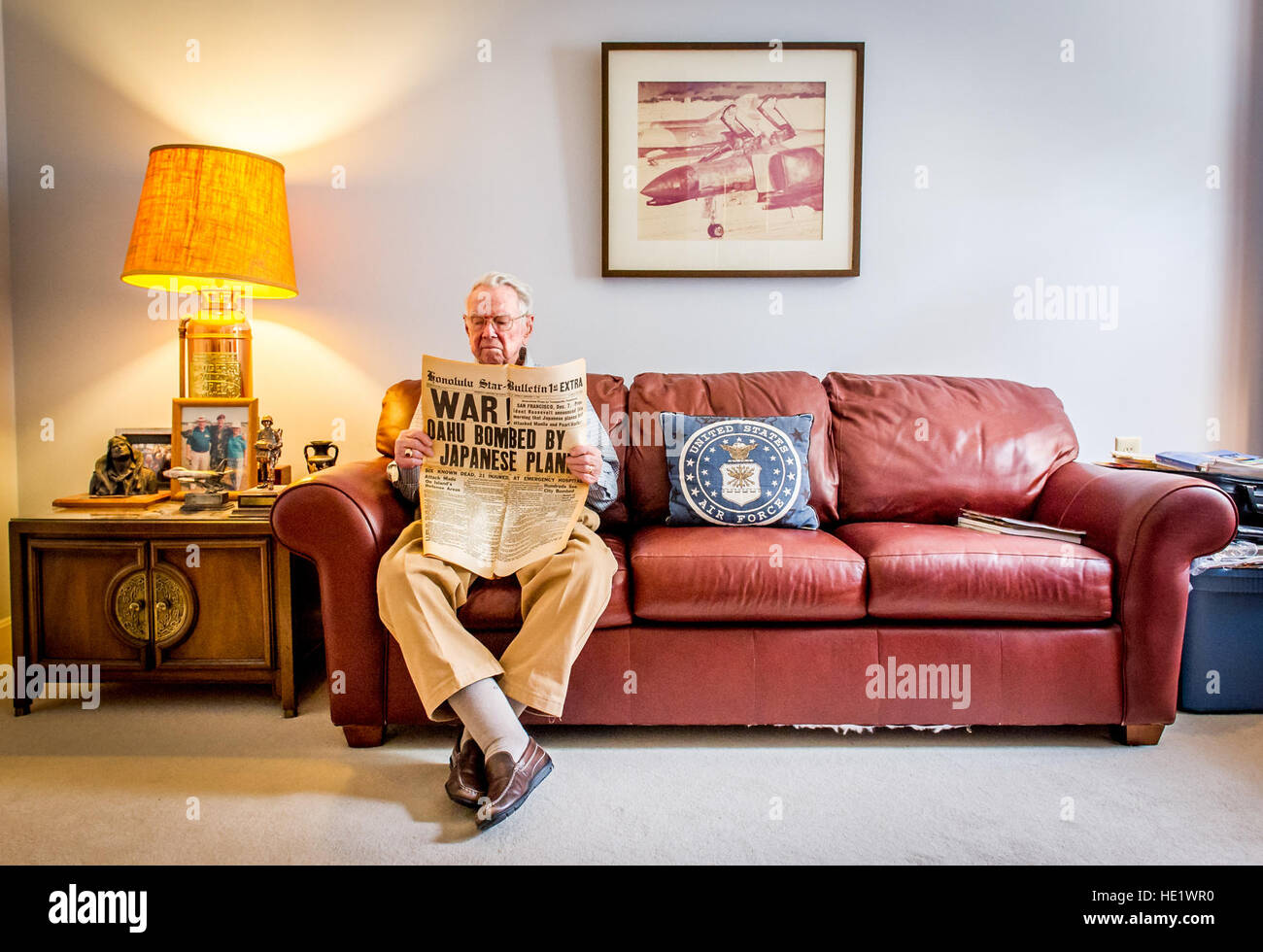 Frederick Austin Crow, 90, who witnessed the Japanese attack on Pearl Harbor and Hickam Field when he was 15, holds a copy of the Honolulu Star-Bulletin extra edition from December 7, 1941 at his apartment in the Baywoods Retirement Community in Annapolis, Md.,Apr 26, 2016.   J.M. Eddins Jr. Stock Photo