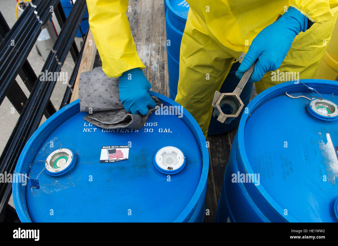 An aircraft maintainer from the 910th Airlift Wing prepares barrels of mosquito insecticide before it is transferred into the tanks of a C-130 Hercules at Joint Base Charleston, S.C. May 5, 2016. Spraying less than one ounce of the chemical per acre effectively limits the mosquito population near the base. The mission of the 910th at Youngstown Air Reserve Station, Ohio, is to maintain the Department of Defense's only large area fixed-wing aerial spray capability to control disease-carrying insects, pest insects, undesirable vegetation and to disperse oil spills in large bodies of water. /Mast Stock Photo