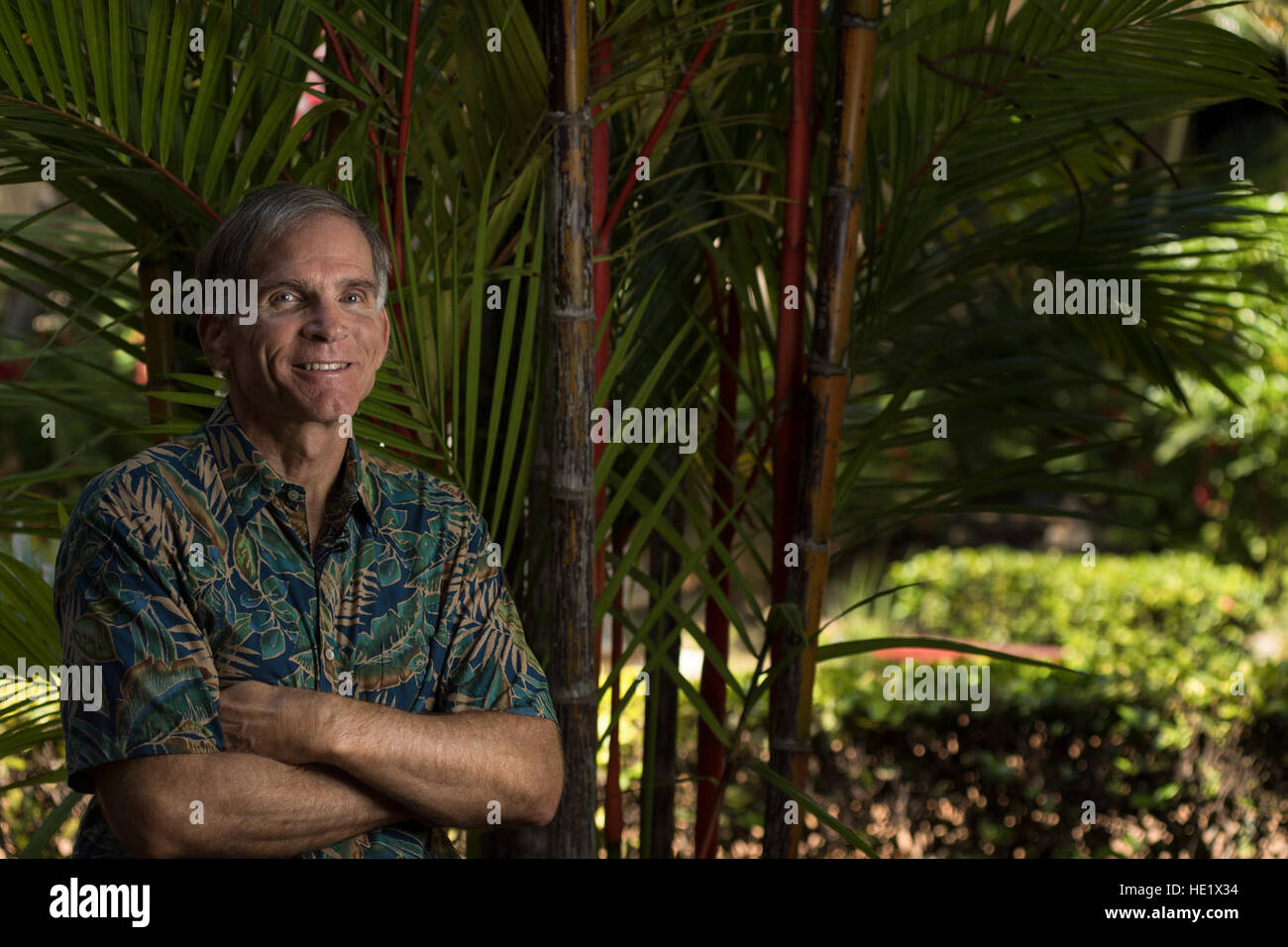 PACAF historian Charles Nicholls, photographed at the PACAF headquarters building that was once the Hickam barracks. The shrapnel scars, bullet holes and bomb damage are preserved on the buildings and hangers of Hickam and Wheeler Fields.  TSgt Brandon Shapiro Stock Photo