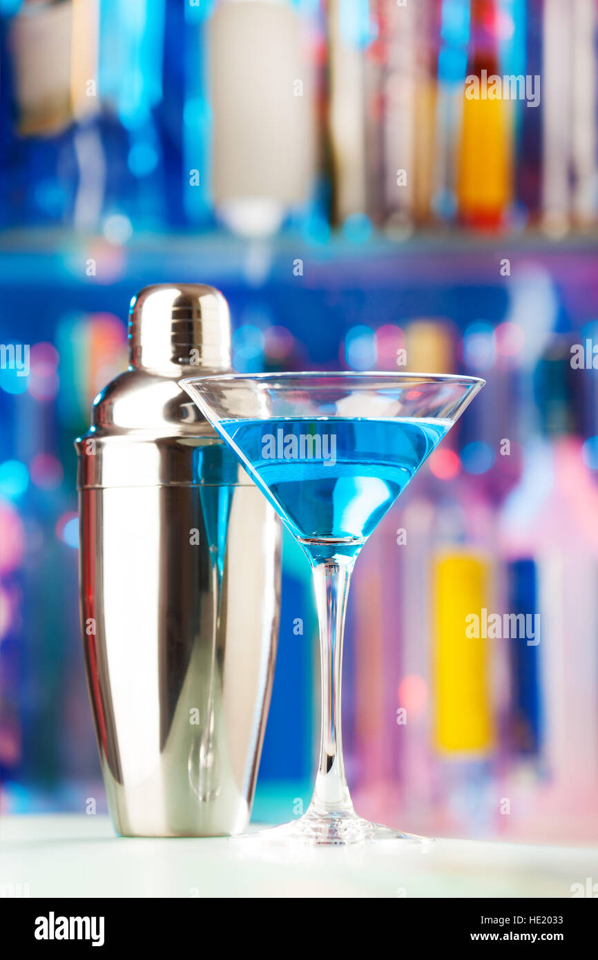 Martini glass with liquor and shaker at bar Stock Photo Alamy