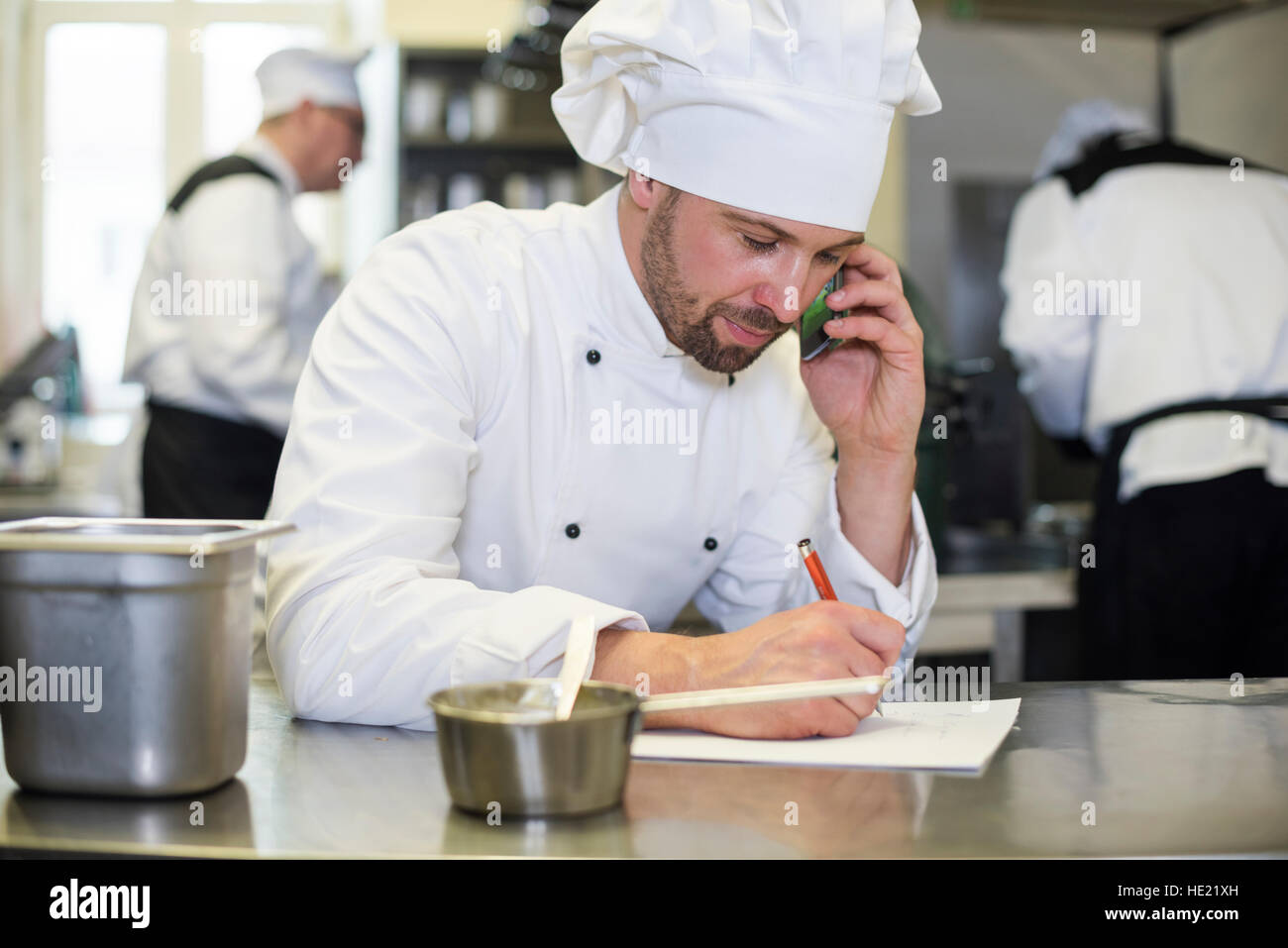 Chef making order for the supplier Stock Photo