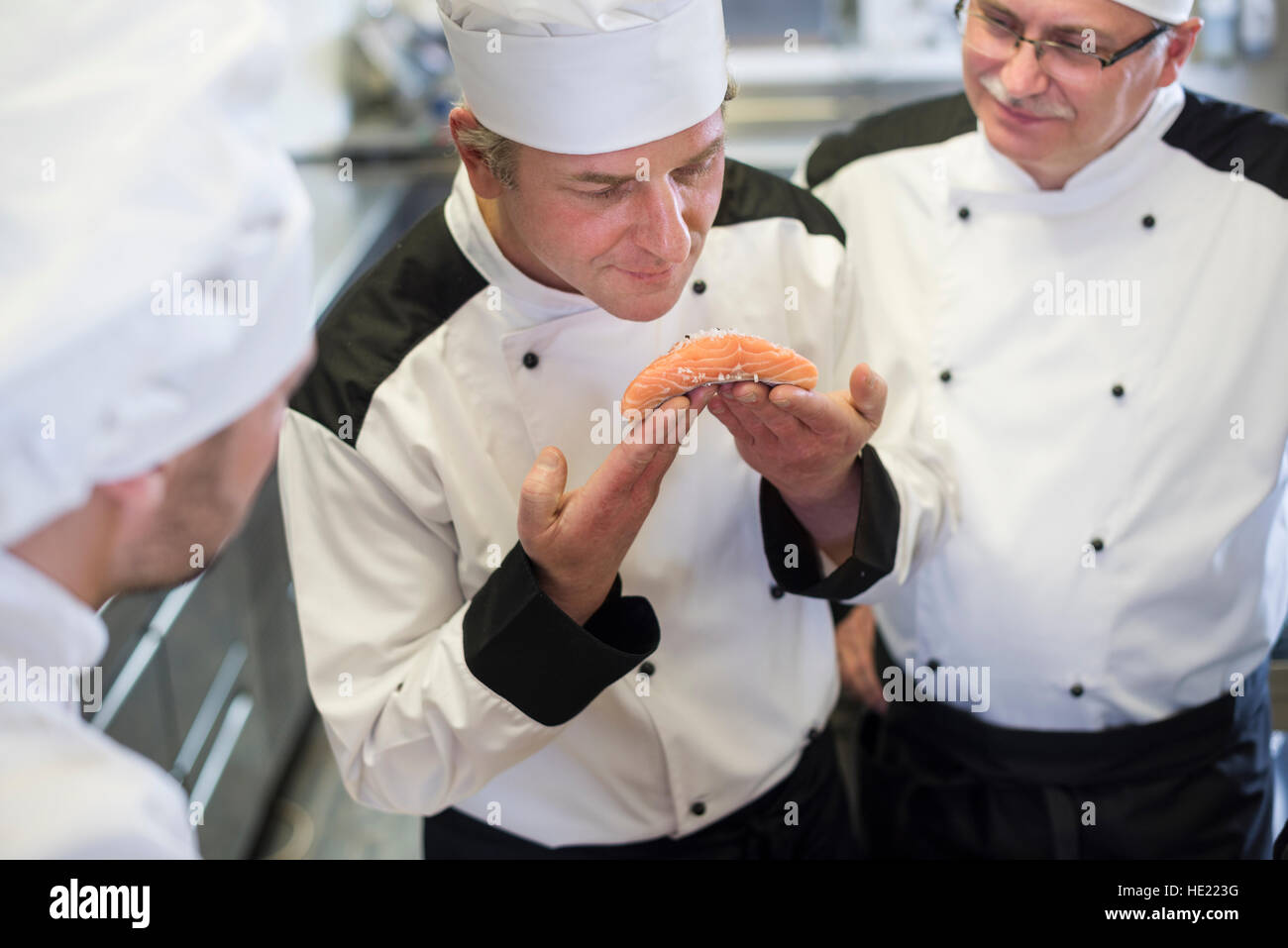 Professional chef cooking fish hi-res stock photography and images - Alamy