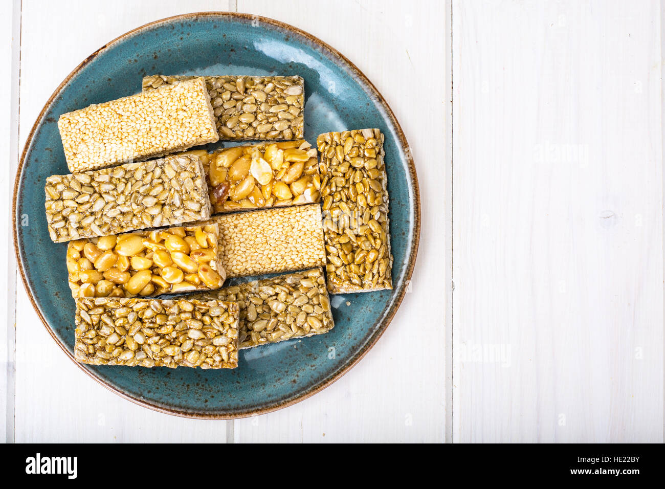 Kozinaki with seeds, nuts, sesame seeds and honey Stock Photo Alamy