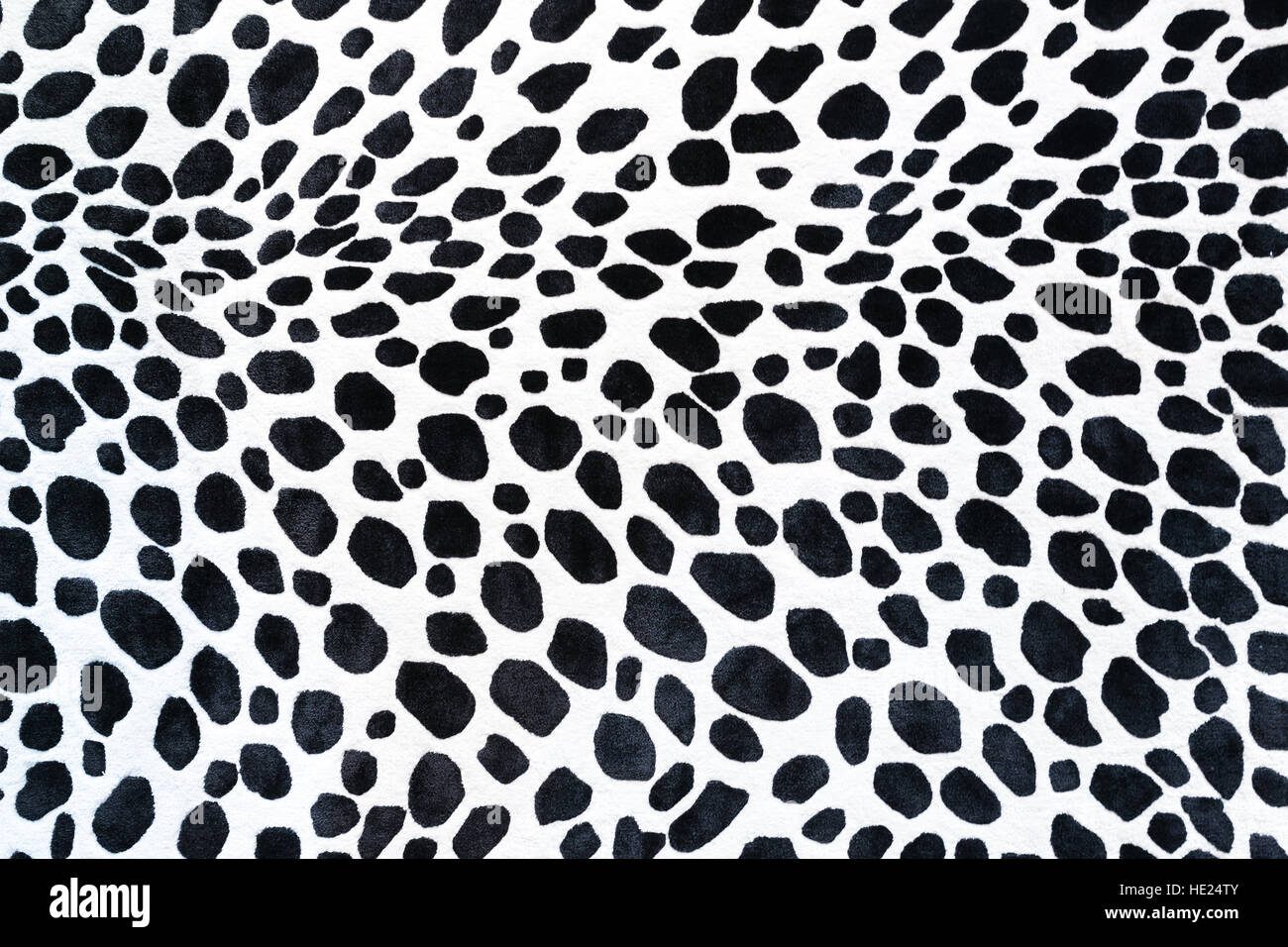 Seamless animal pattern for textile design. Seamless pattern of dalmatian spots. Natural textures. Stock Photo
