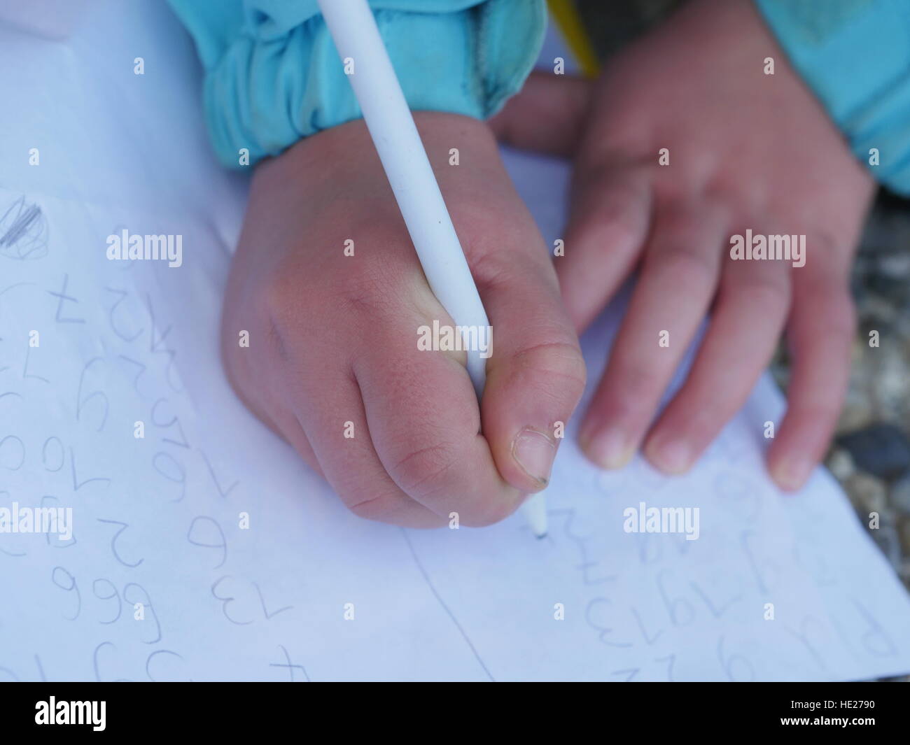 child hand writing Stock Photo - Alamy
