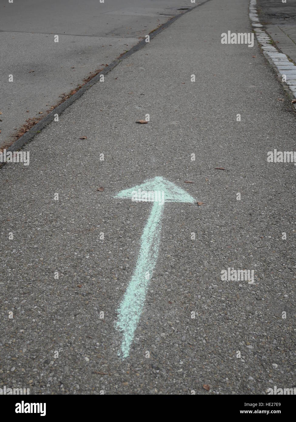 chalk arrow on road Stock Photo - Alamy