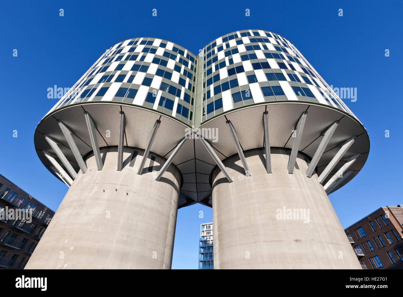 The two former Aalborg Portland cement silos in Nordhavn Copenhagen now converted to modern office blocks, the Portland Towers Stock Photo
