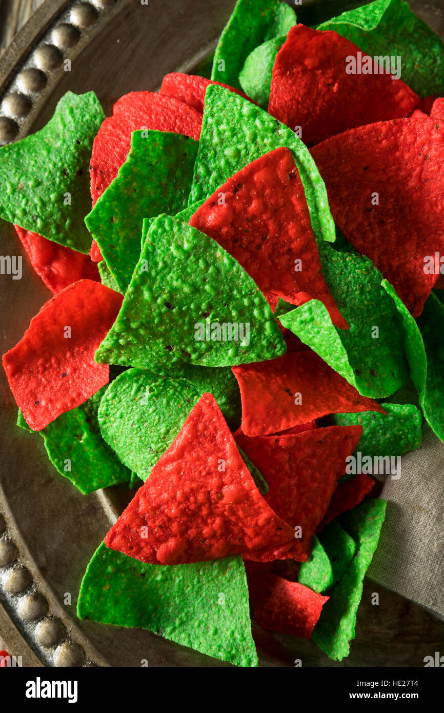 Festive Christmas Green and Red Tortilla Chips with Salsa Stock Photo