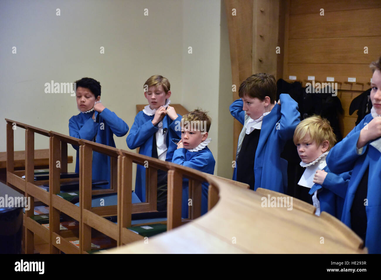 Wells Cathedral Choir choristers preparing for evensong on Easter day in the song school at Wells Cathedral. Stock Photo