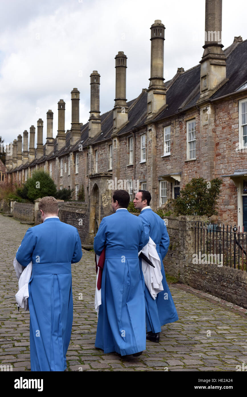 Vicars Choral, Wells Cathedral Choir, walking to their homes in Vicars Close after  evensong at the Cathedral on Easter Day. Stock Photo