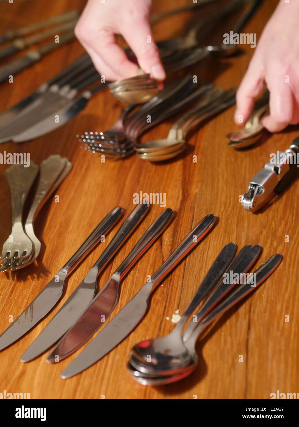 cutlery table hand Stock Photo Alamy
