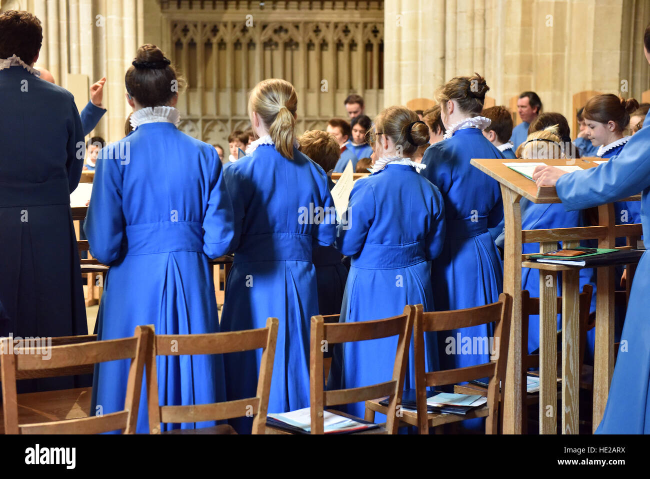 Choristers from Wells Cathedral Choir on Easter Day getting ready and rehearsing for evensong. Stock Photo