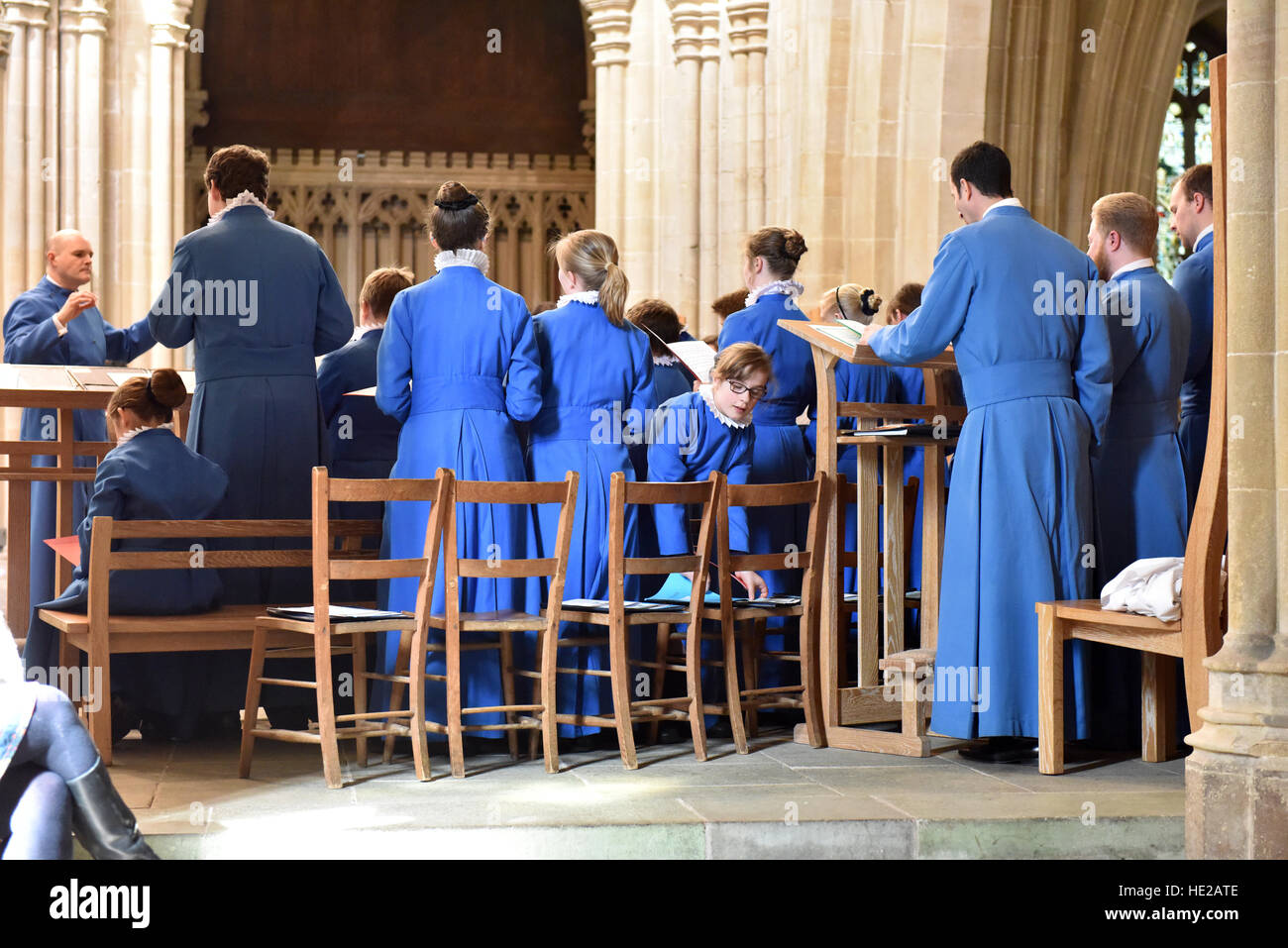 Choristers from Wells Cathedral Choir on Easter Day getting ready and rehearsing for evensong. Stock Photo