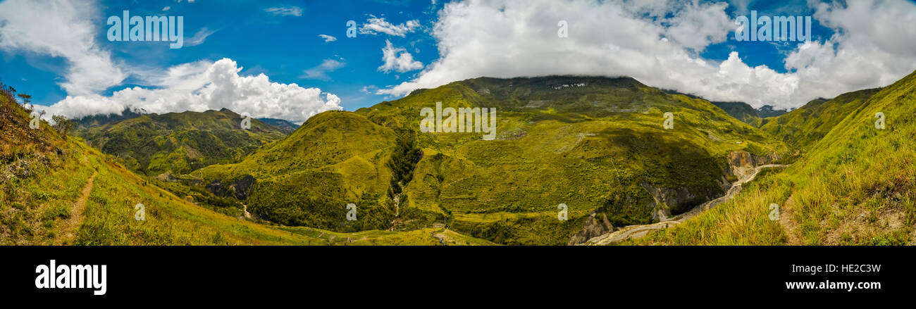 Panoramic photo of mountains of rich greenery in Dani circuit near Wamena, Papua, Indonesia. In this region, one can only meet people from isolated lo Stock Photo