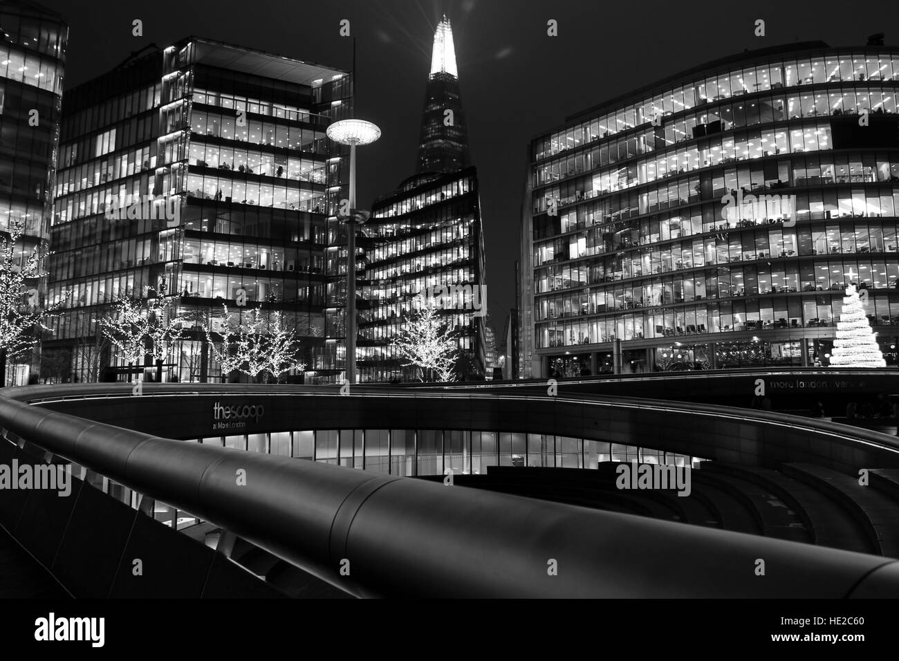 A view of The Shard and The Scoop in London at night just before Christmas. Stock Photo