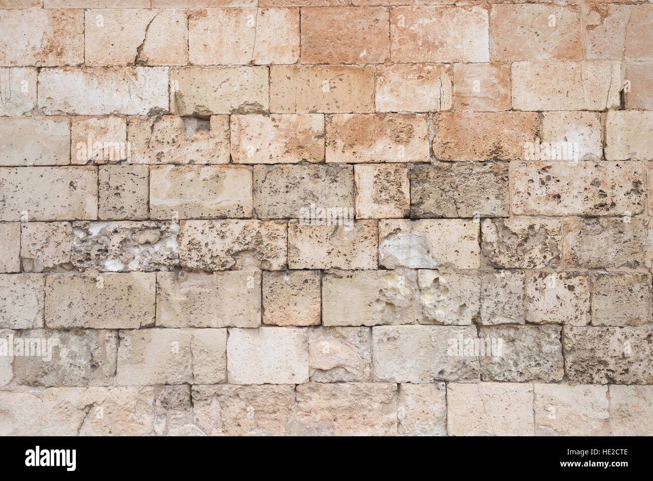 Old and weathered large stone blocks wall texture Stock Photo