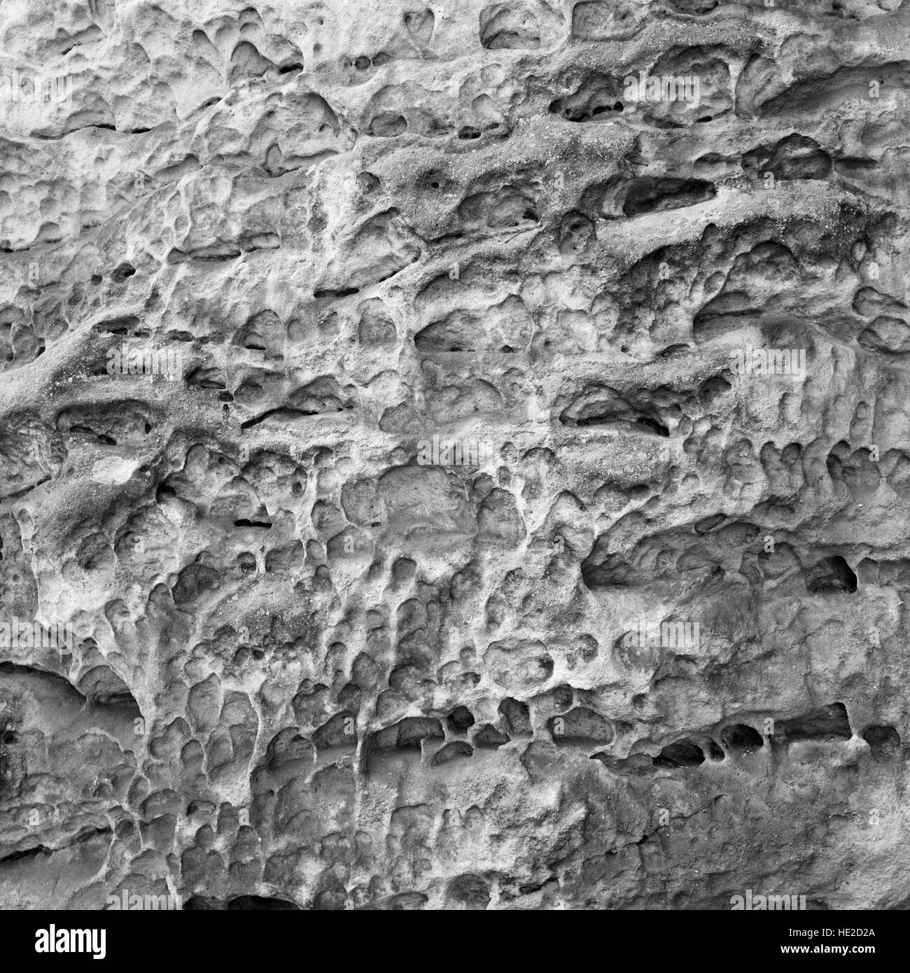 Stone wall watered down by a long time weather erosion Stock Photo Alamy