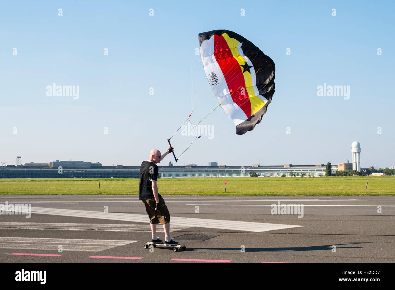 Land surfing with kite at Tempelhof Park former airport in Berlin