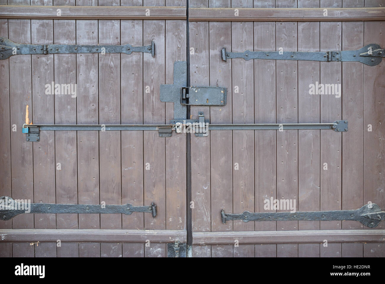 Big wooden gate with iron latches Stock Photo Alamy