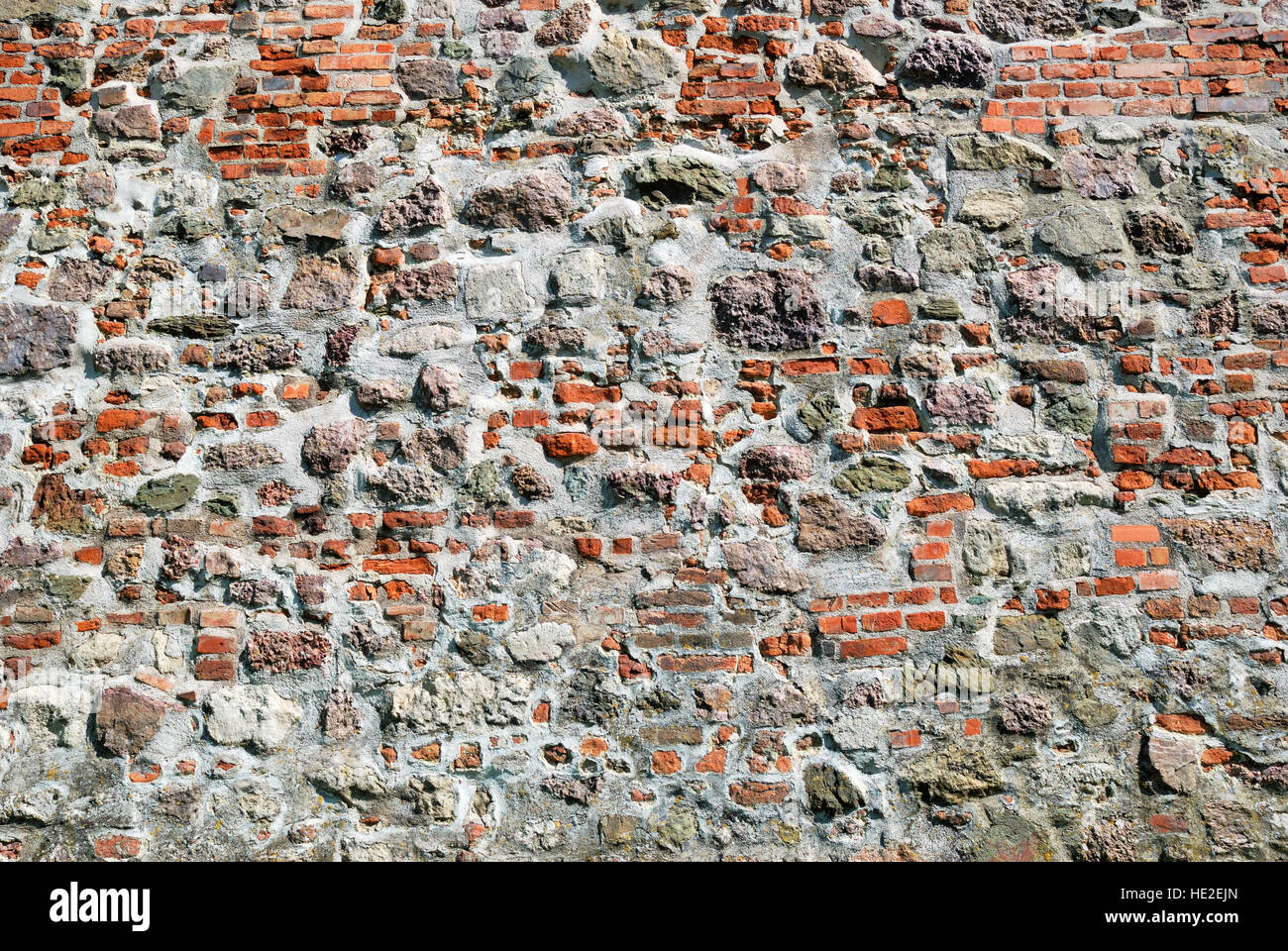 Old red brick stone wall texture Stock Photo - Alamy
