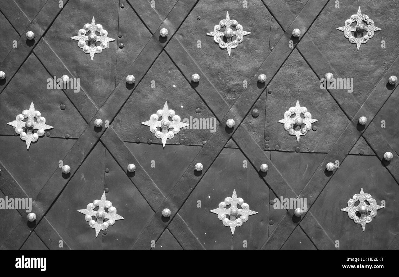 Antique decorated metal door background Stock Photo - Alamy