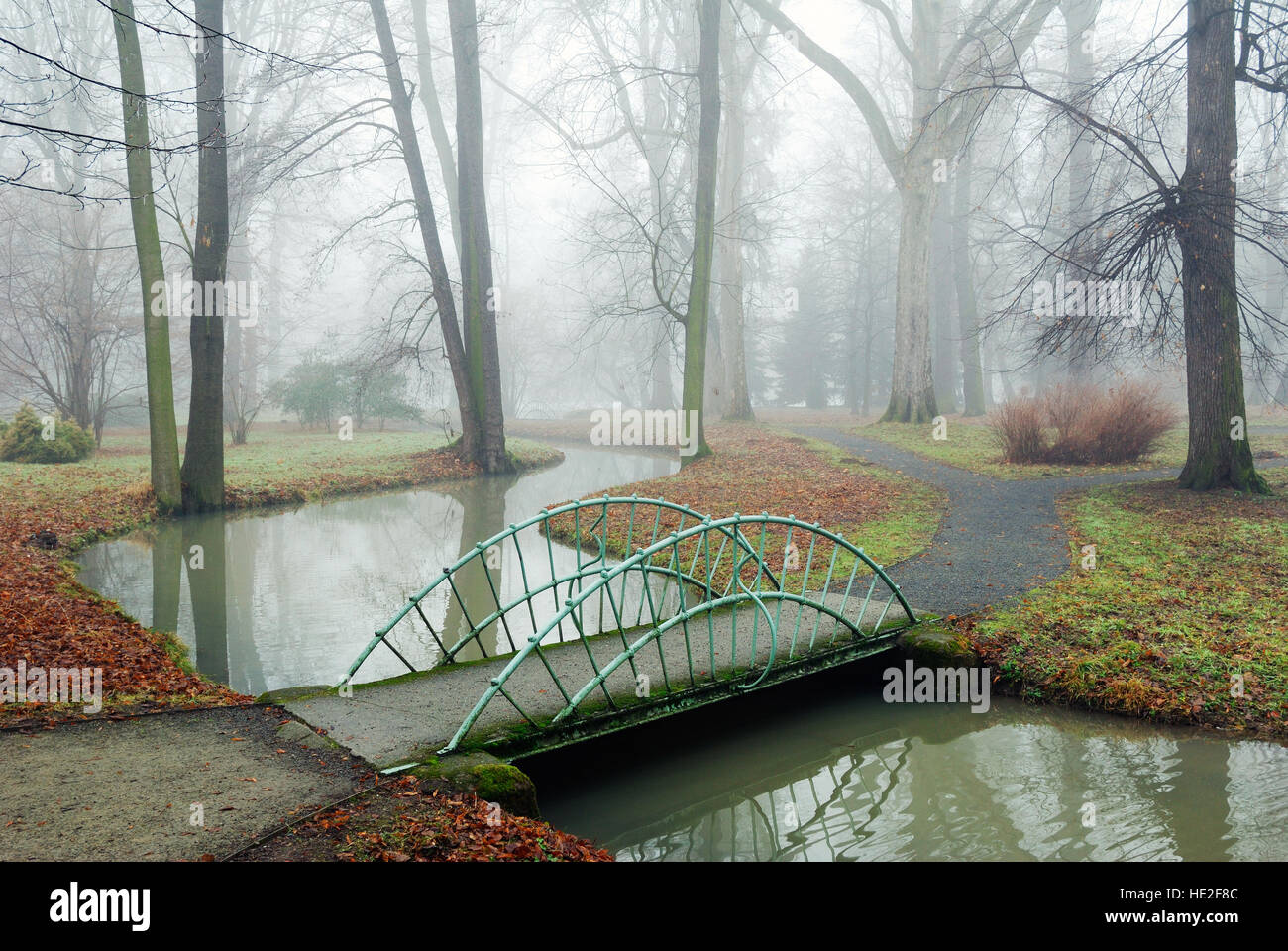 Small garden bridge over a rivulet in the chateau gardens in Kromeriz ...