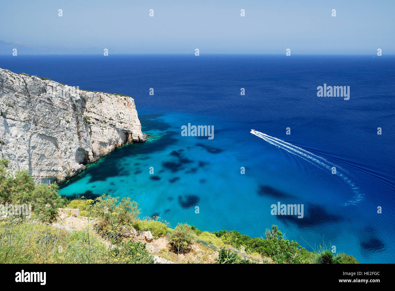 Sea View with speeding boat Stock Photo - Alamy