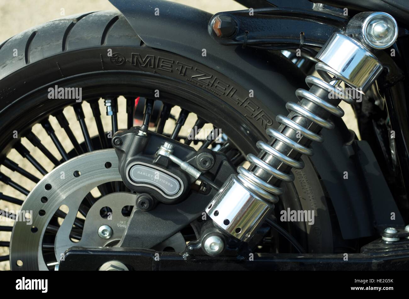 Rear shock absorber of a Harley Davidson motorcycle Stock Photo